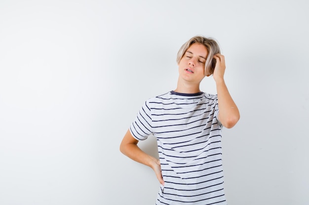 Handsome teen boy in a striped t-shirt