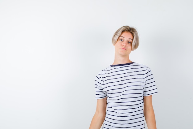 Handsome teen boy in a striped t-shirt