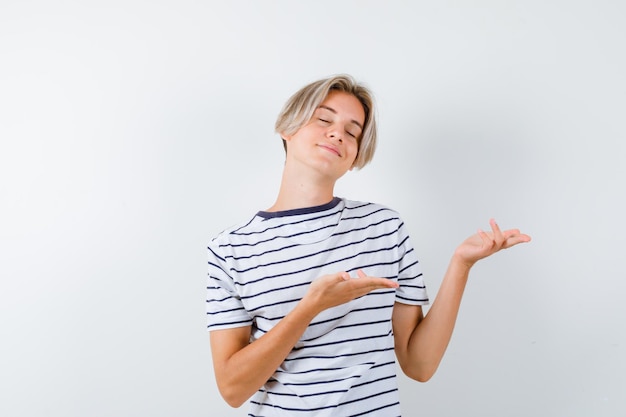 Handsome teen boy in a striped t-shirt