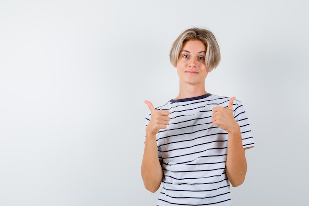 Free photo handsome teen boy in a striped t-shirt