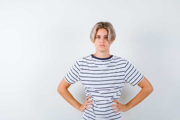 Free photo handsome teen boy in a striped t-shirt