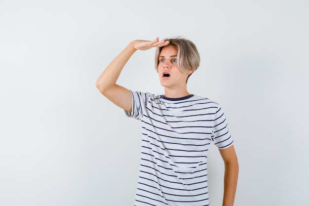 Handsome teen boy in a striped t-shirt