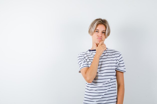 Handsome teen boy in a striped t-shirt