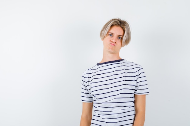 Handsome teen boy in a striped t-shirt