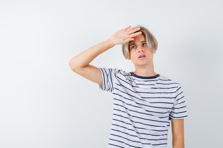 Free Photo handsome teen boy in a striped t-shirt