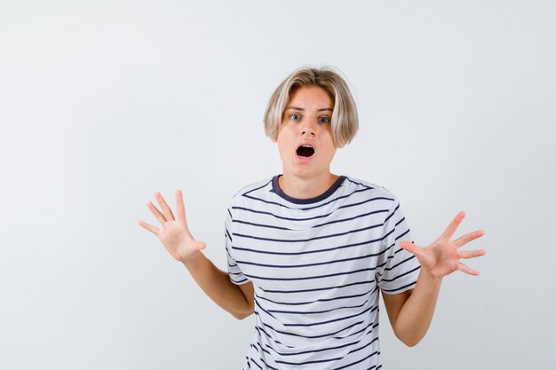 Handsome teen boy in a striped t-shirt