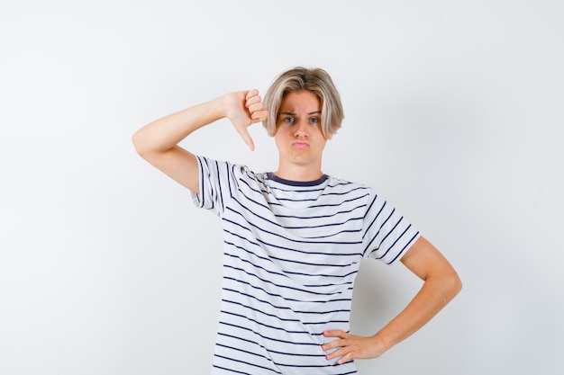 Handsome teen boy in a striped t-shirt