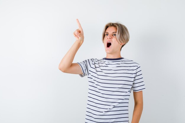 Handsome teen boy in a striped t-shirt