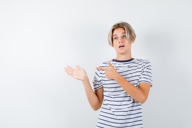 Handsome teen boy in a striped t-shirt