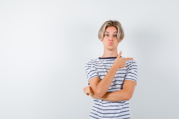 Handsome teen boy in a striped t-shirt