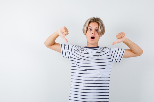 Handsome teen boy in a striped t-shirt