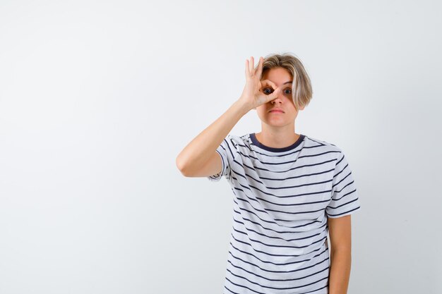 Handsome teen boy in a striped t-shirt