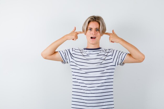 Handsome teen boy in a striped t-shirt