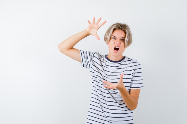 Handsome teen boy in a striped t-shirt