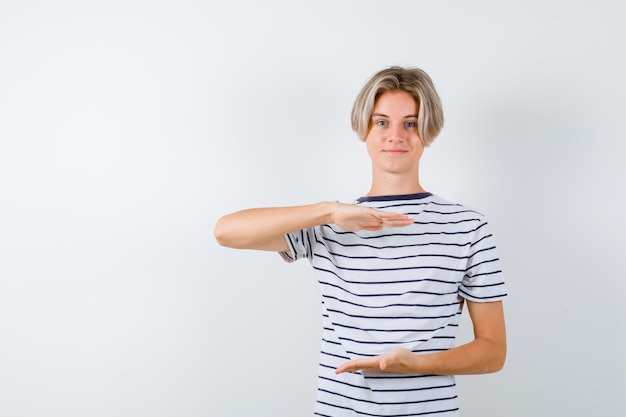 Handsome teen boy in a striped t-shirt