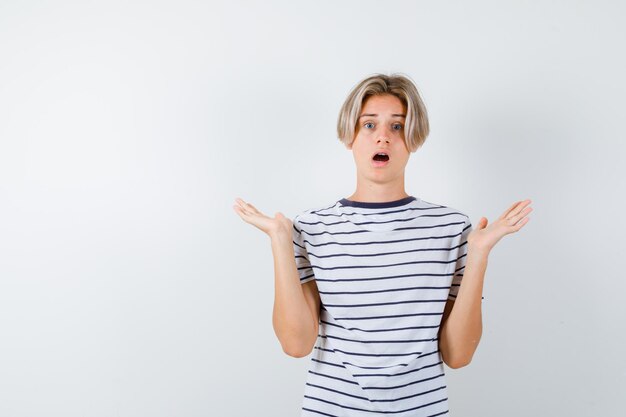 Handsome teen boy in a striped t-shirt