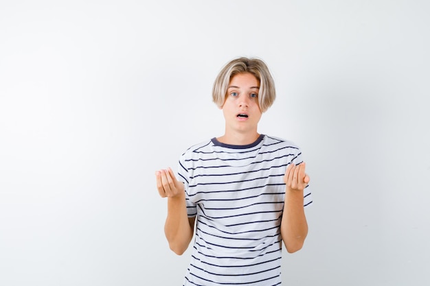 Handsome teen boy in a striped t-shirt