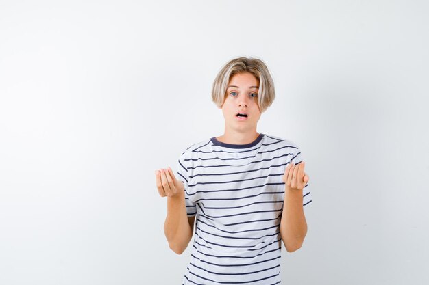 Handsome teen boy in a striped t-shirt