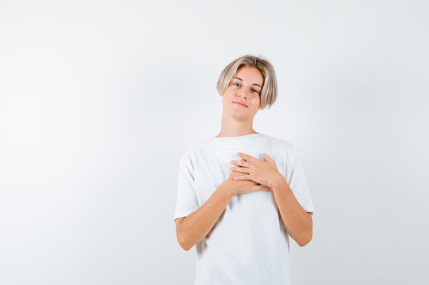 Handsome teen boy in a white t-shirt