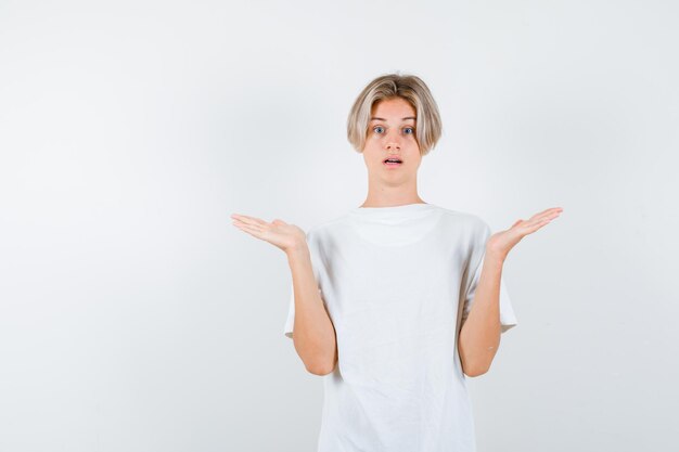 Handsome teen boy in a white t-shirt