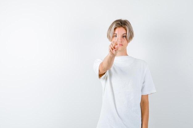 Handsome teen boy in a white t-shirt