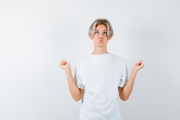 Handsome teen boy in a white t-shirt