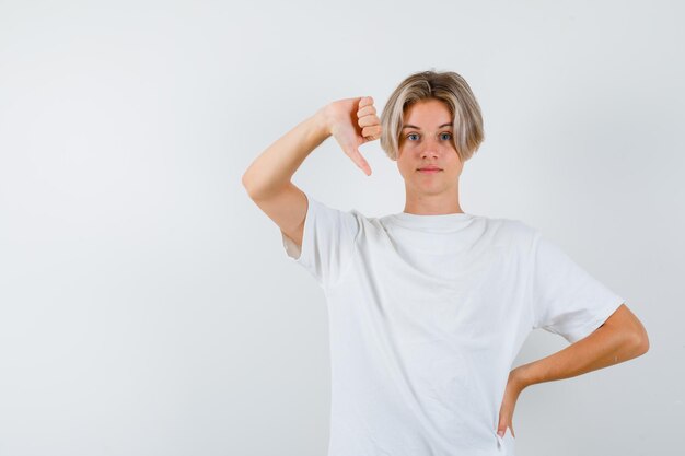 Handsome teen boy in a white t-shirt