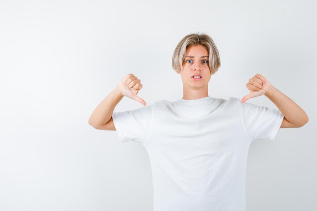 Handsome teen boy in a white t-shirt