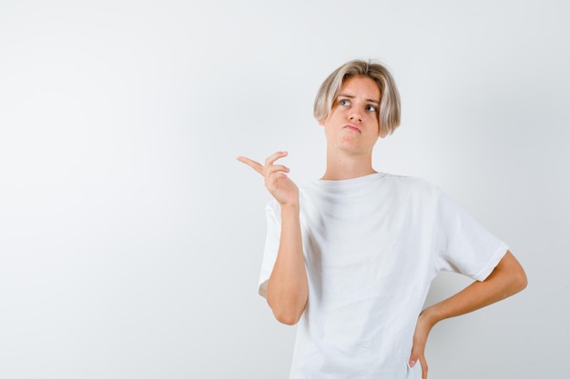 Handsome teen boy in a white t-shirt