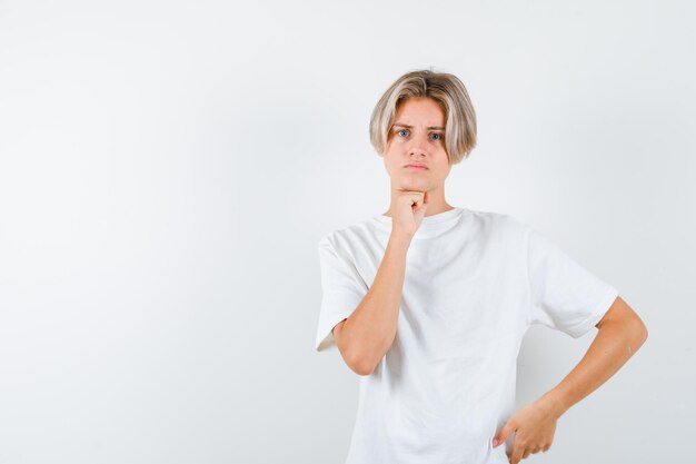 Handsome teen boy in a white t-shirt