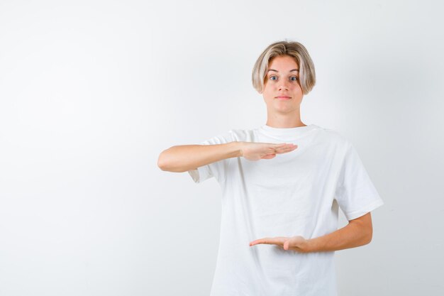 Handsome teen boy in a white t-shirt