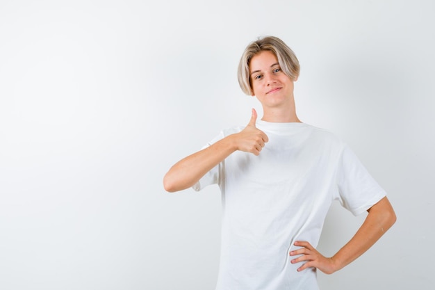 Handsome teen boy in a white t-shirt