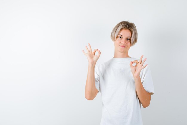 Handsome teen boy in a white t-shirt