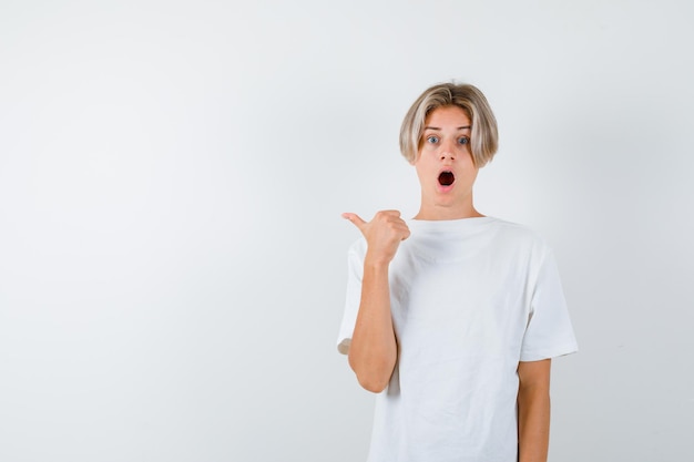 Handsome teen boy in a white t-shirt