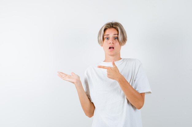 Handsome teen boy in a white t-shirt