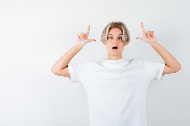 Handsome teen boy in a white t-shirt