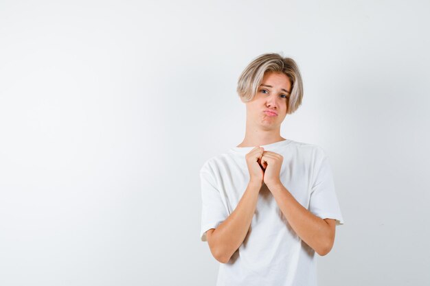 Handsome teen boy in a white t-shirt