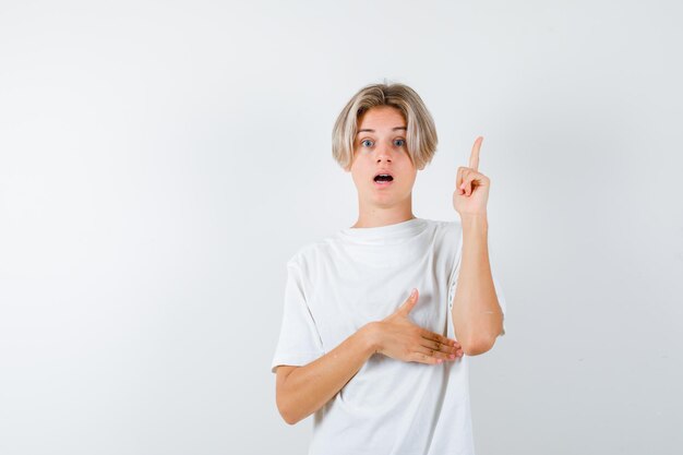 Handsome teen boy in a white t-shirt