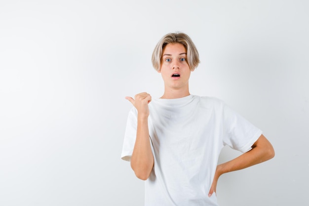 Handsome teen boy in a white t-shirt