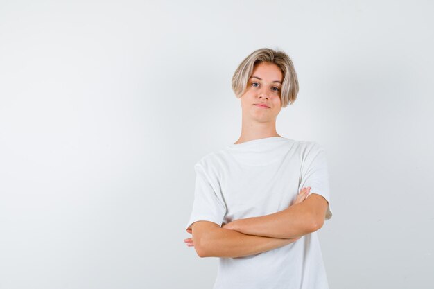 Handsome teen boy in a white t-shirt