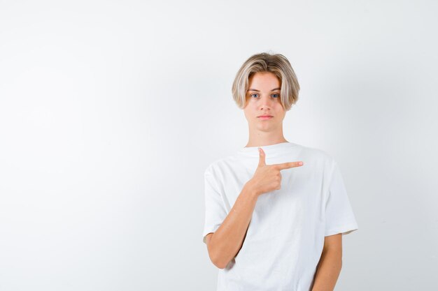 Handsome teen boy in a white t-shirt