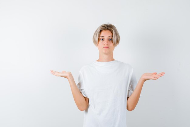 Handsome teen boy in a white t-shirt