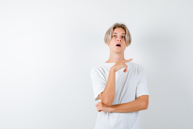 Handsome teen boy in a white t-shirt