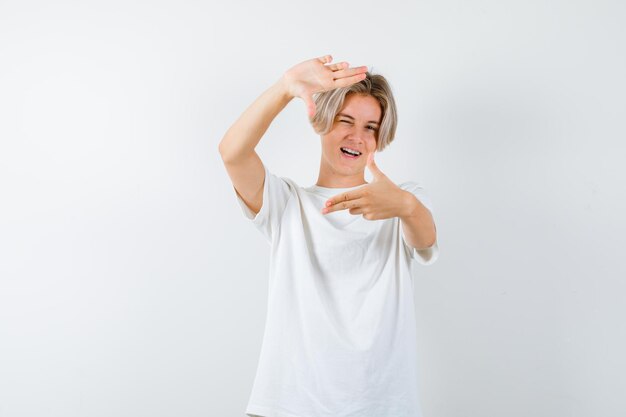 Handsome teen boy in a white t-shirt