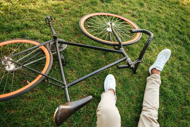 Handsome young african man early morning with bicycle