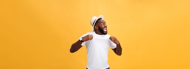 Free photo handsome young afroamerican man employee feeling excited gesturing actively keeping fists clenched e