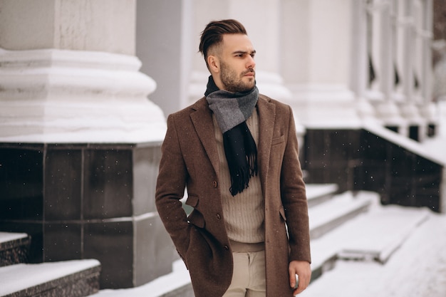 Handsome young business man outside in winter