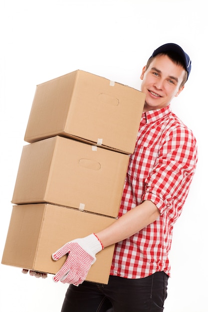 Handsome young courier with brown box