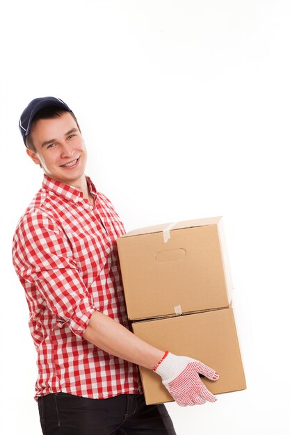 Handsome young courier with brown box