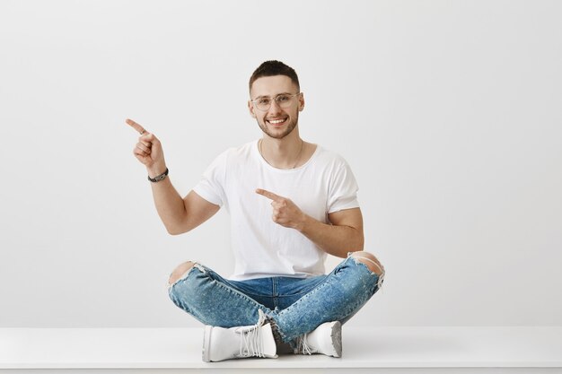 handsome young guy with glasses posing